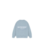 The "Represent Mini Owners Club Powder Blue Sweatshirt" is more than just a piece of clothing; it's a symbol of camaraderie,